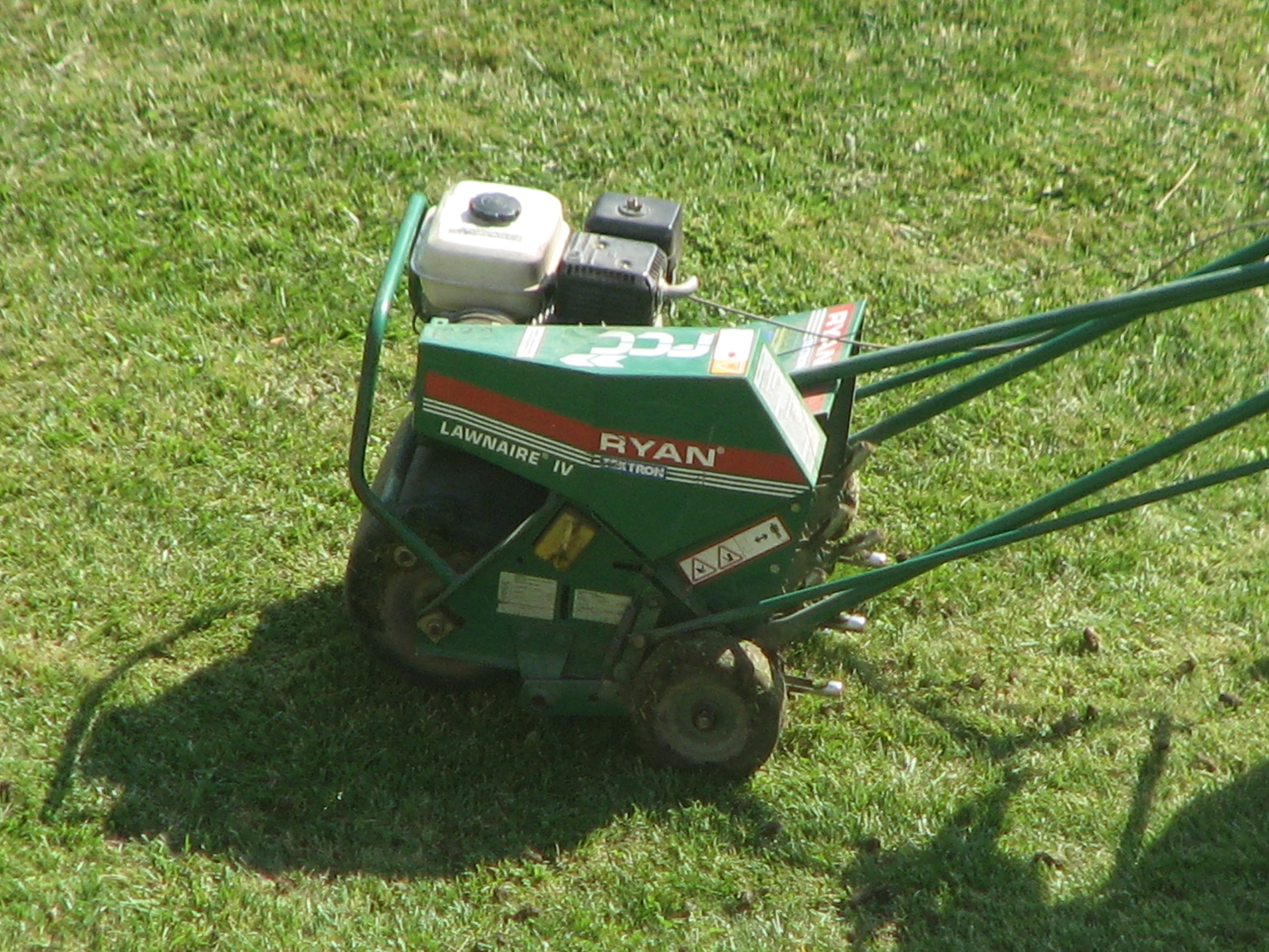 Service d'aération de la pelouse
